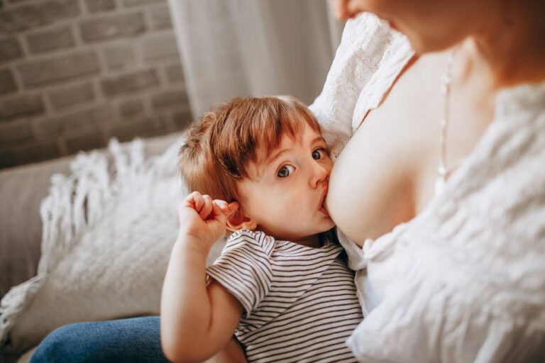 A heartwarming scene of a mother breastfeeding her child, capturing the intimate bond and affection.